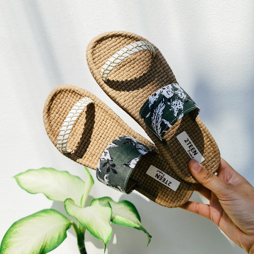 Handmade sandals with white strap and green patterns